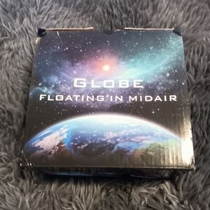 Globe Floating in Midair - Black and Blue